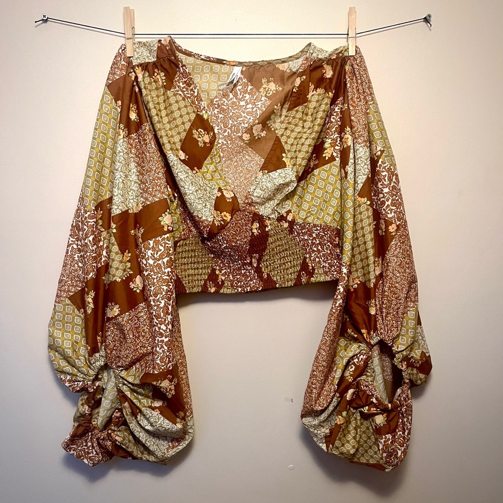 cropped top with flowing sleeves